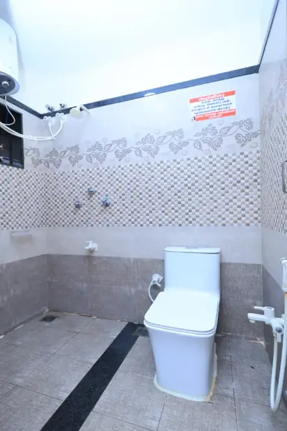 Clean bathroom facilities at Thendral Inn Vellore